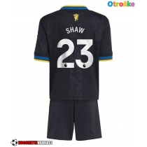 Otroške Nogometnih dresov Manchester United Luke Shaw #23 Tretji 2025-26 Kratki rokavi (+ hlače)